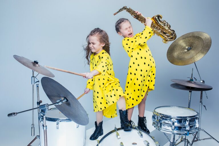 The teen music band performing in a recording studio